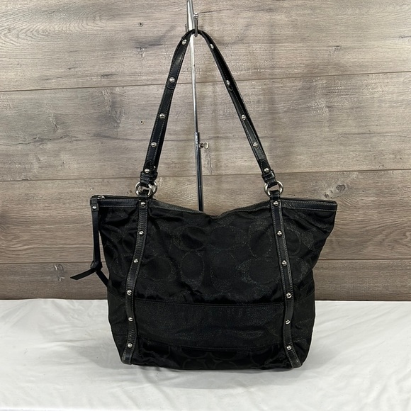 Coach Handbags - Coach 12911 signature shimmer black tote with leather trim and nickel studs.